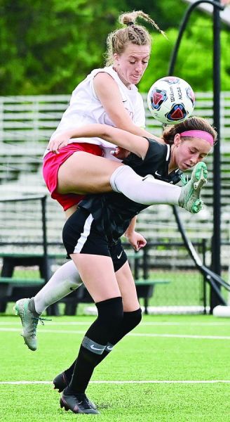 Cloud cover — Union senior defender Emma Cloud goes up to play the ball away from Ft. Zumwalt South’s Audrey Smith Wednesday during the MSHSAA Class 3 semifinals at Worldwide Technology Soccer Park in Fenton. Cloud assisted on Union’s goal, but Smith scored the game winner with 1:43 to play as Ft. Zumwalt South prevailed, 2-1. Both teams won Thursday as Union defeated St. Louis Notre Dame for third and Ft. Zumwalt North beat Grain Valley for the title, 5-2. [Bill Battle | Washington (Missouri) Missourian]