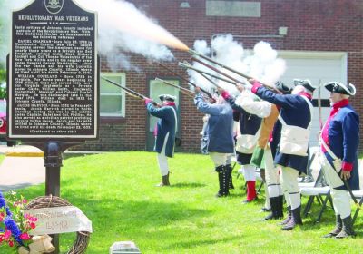 The Memorial Day Service in Vienna included a musket salute presented by the Long Knives Chapter Sons of the American Revolution, with “Taps” played by Matt Johnson and Cody Johnson. [Lonnie J. Hinton | The Vienna (Illinois) Times]