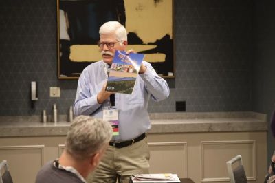 NNA Postal Chair Matt Paxton, publisher, The News-Gazette, Lexington, Virginia, shares an idea during the Great Idea Exchange.